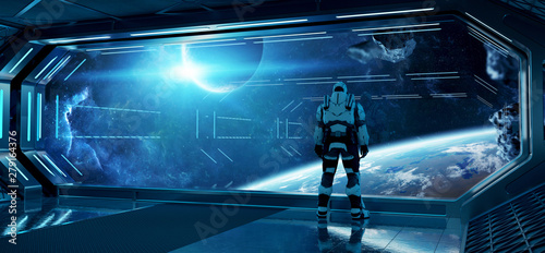 Fototapeta Naklejka Na Ścianę i Meble -  Astronaut in futuristic spaceship watching space through a large window 3d rendering elements of this image furnished by NASA