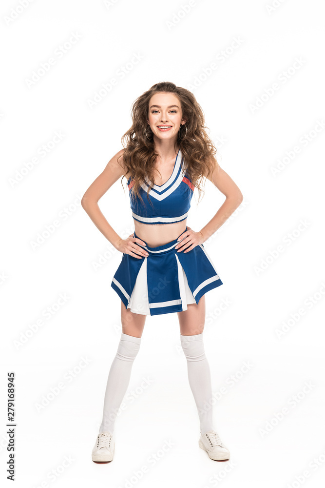 full length view of sexy happy cheerleader girl in blue uniform with akimbo isolated on white full length view of sexy happy cheerleader girl in blue uniform with akimbo isolated on white