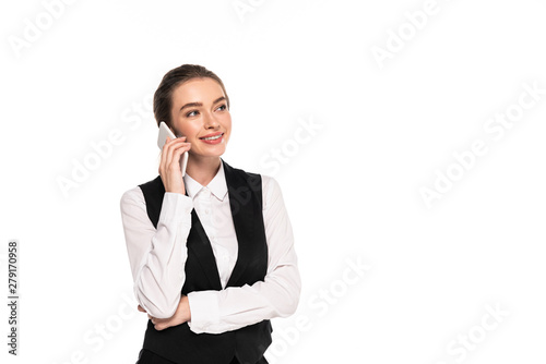 happy young waitress talking on smartphone isolated on white