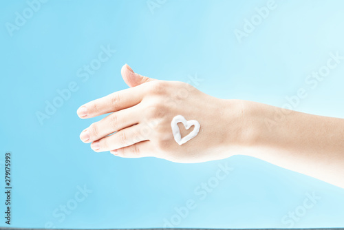 hand on blue background © SHOTPRIME STUDIO