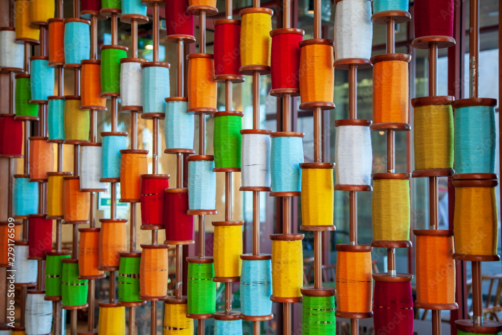 multicolored thread bobbin background multicolored thread bobbin background