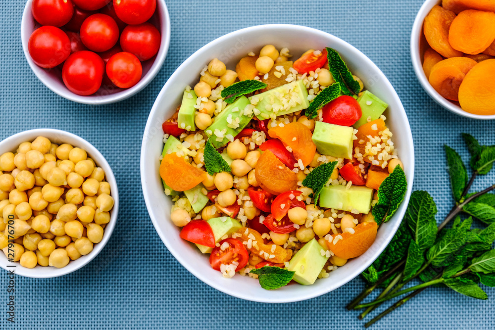 Summer Lunch Bowl With Avocado Chickpeas Tomatoes and Bulgur Wheat Summer Lunch Bowl With Avocado Chickpeas Tomatoes and Bulgur Wheat