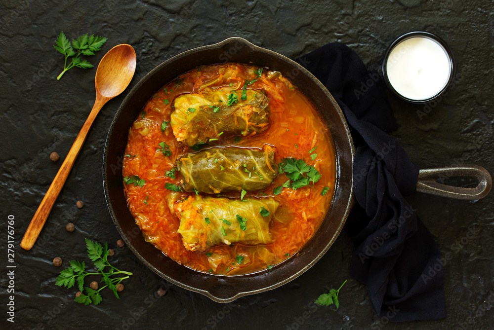 Ukrainian traditional dish with cabbage and stuffed cabbage. Selective focus.