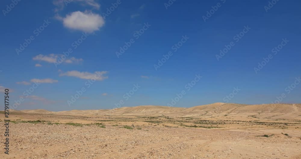Zoom in onto Hills on wide panorama of desert Negev Zoom in onto Hills on wide panorama of desert Negev