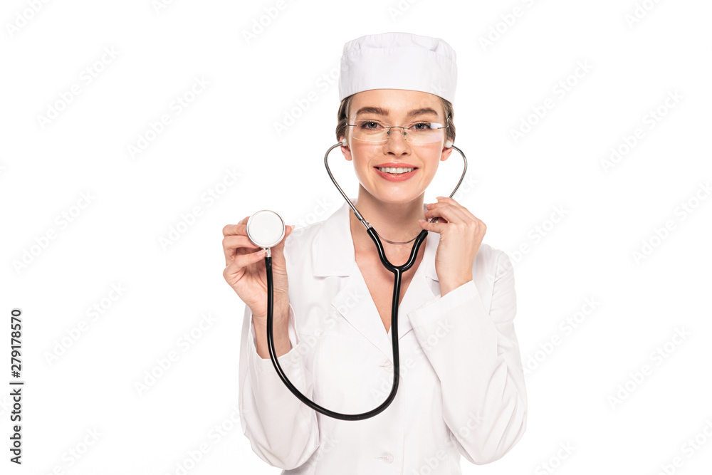 young smiling doctor in white coat and glasses holding stethoscope isolated on white young smiling doctor in white coat and glasses holding stethoscope isolated on white