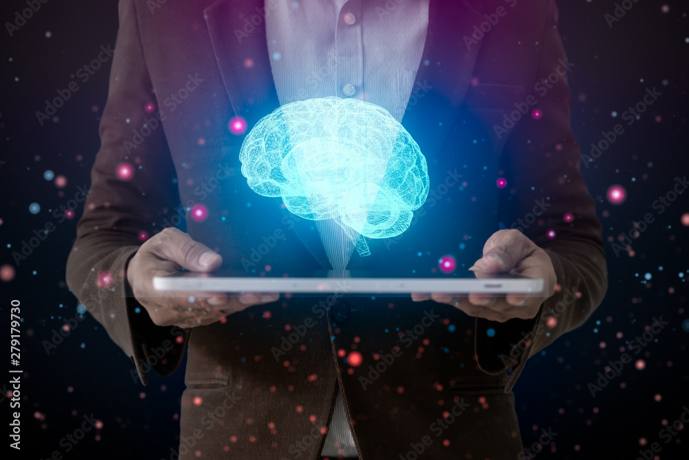 Obraz premium Human hand holding tablet and brain, AI (Artificial Intelligence)Technology, thinking or iot (internet of thing) concept.