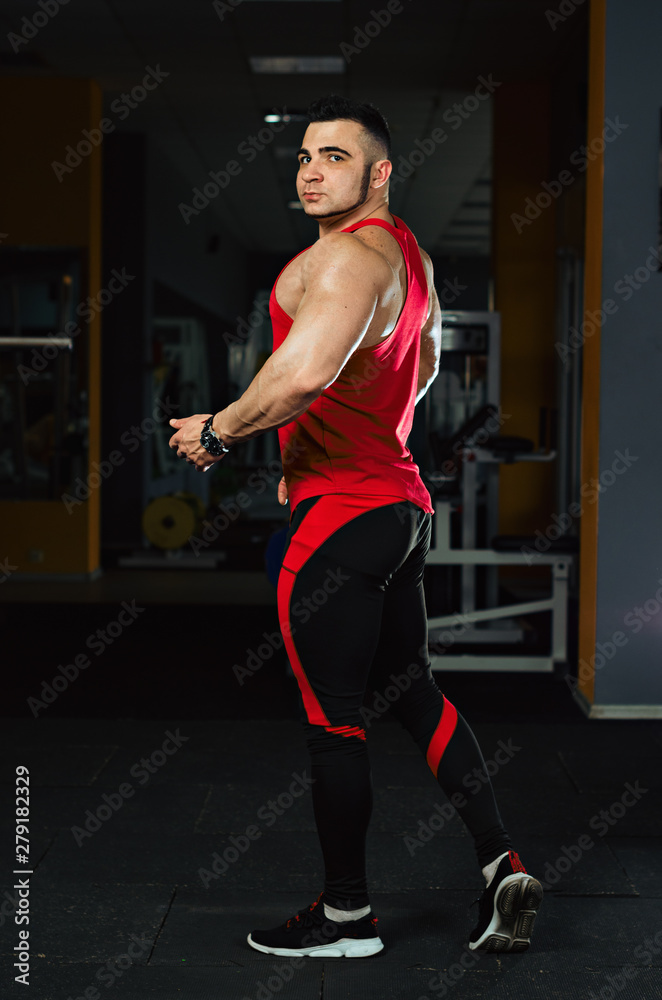 Fototapeta premium sports lifestyle, more muscular body.sports lifestyle, more muscular body. the man is engaged in fitness