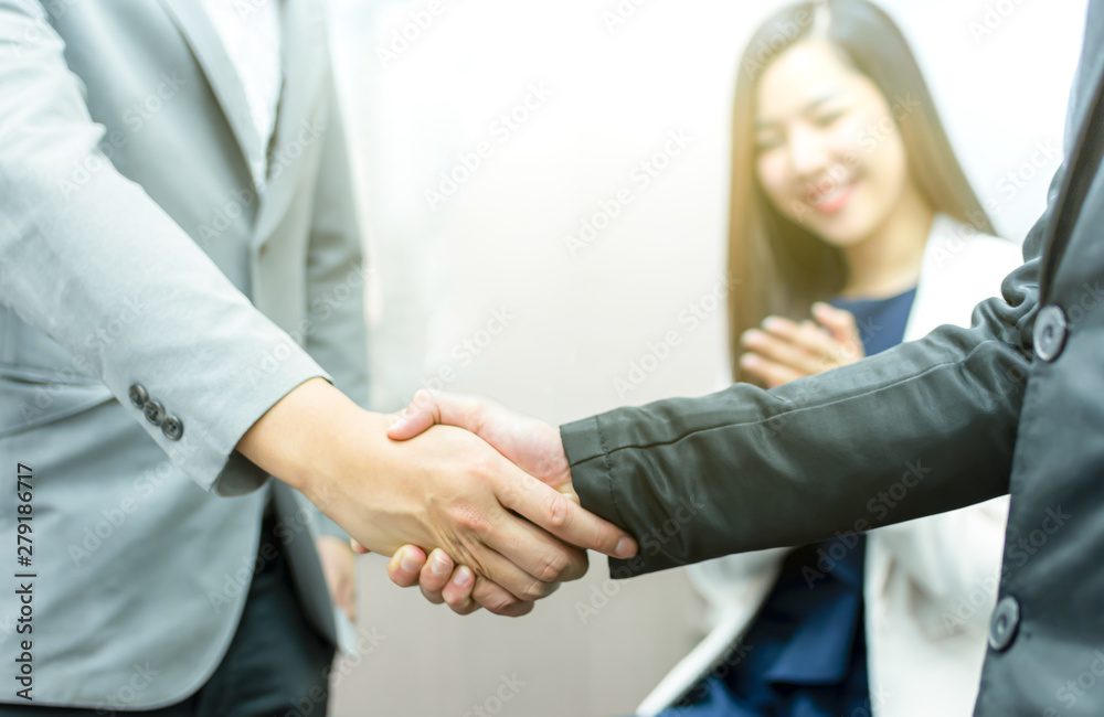 Closeup of handshake for dealing business