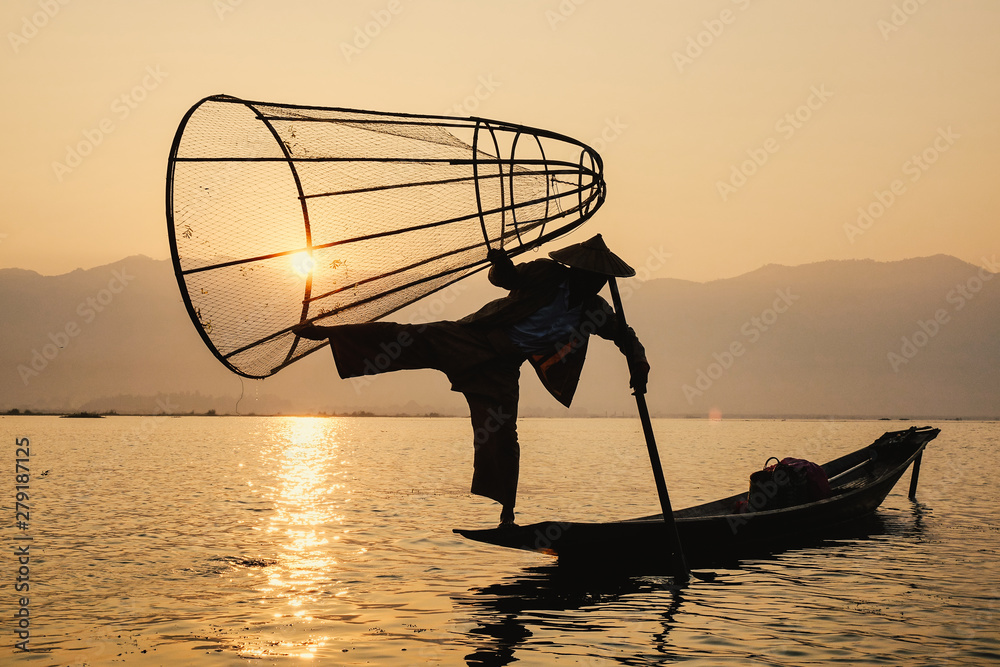 Man catching fish on Inle Lake (Shan State)