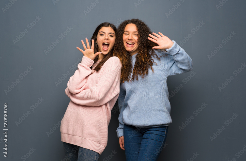 Teenager friends saluting with hand with happy expression Teenager friends saluting with hand with happy expression