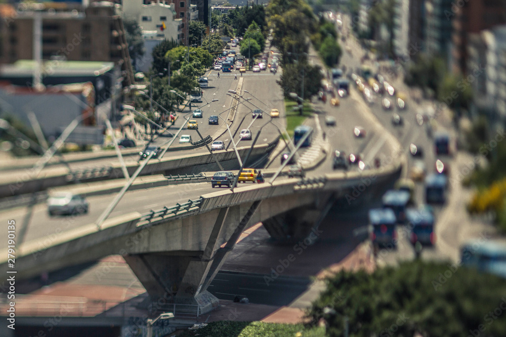 City bridge with cars and trees in tilt shift technique