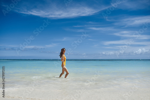 woman running on the beach