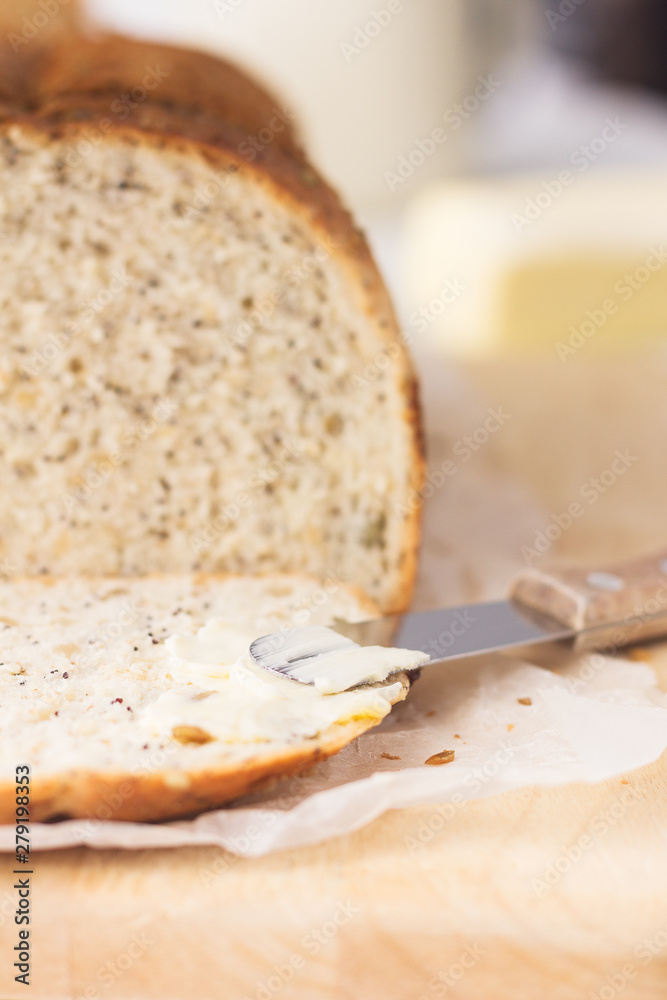 Slice of bread, butter knife and butter Slice of bread, butter knife and butter