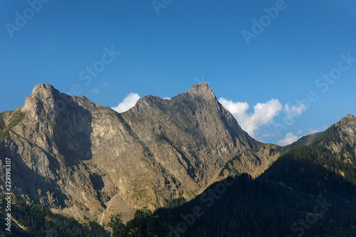 beautiful day in the mountains. beautiful summer weather. mountain on a background of clouds © alas_spb