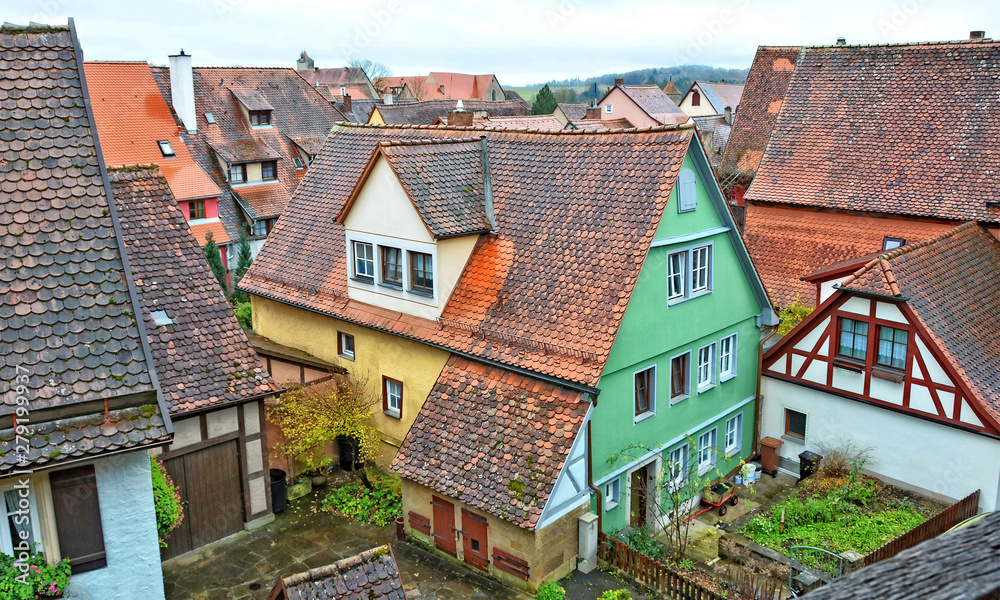 German architecture. Nice houses with red tile roofs. Old town. Germany. Bavaria. Rothenburg ob der Tauber.