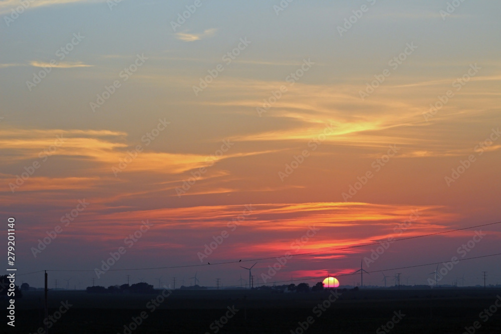 Naklejka premium sunset over the farm