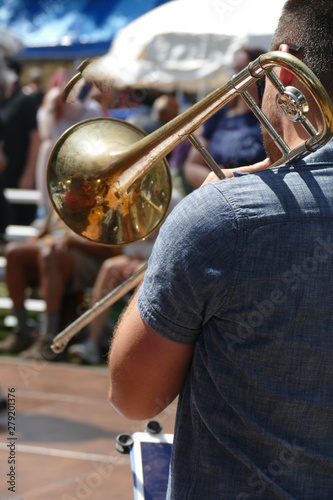 Trombone player entertains the crowd photo