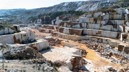 Marble quarry pit full of rocks and blocks in Marmara island, Turkey photo
