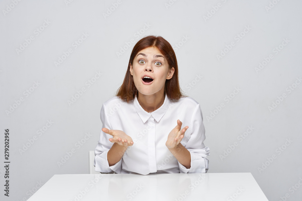 woman sitting at desk with laptop woman sitting at desk with laptop