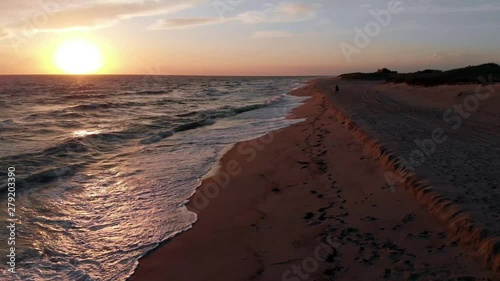 Aerial 4k Footage of Sunset at Miacomet beach, Nantucket, famous tourist attraction and Landmark of Nantucket Island.