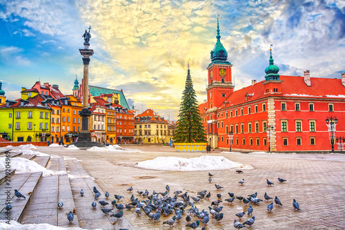 Royal Castle, ancient townhouses and Sigismund's Column in Old town in Warsaw on a Christmas day, Poland, is UNESCO World Heritage Site
