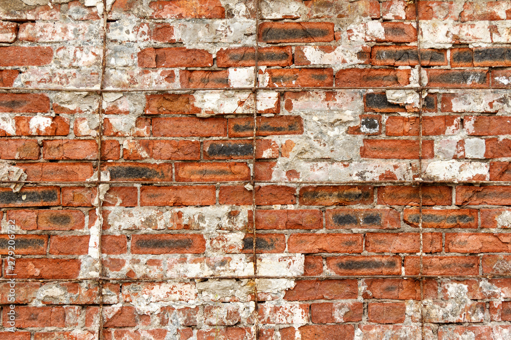 Naklejka premium old brick wall with white and red bricks background