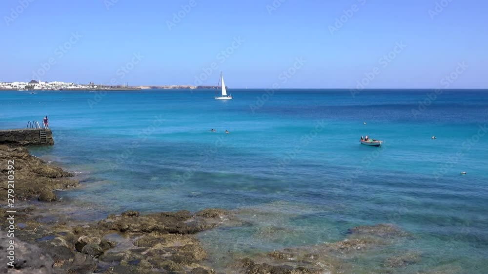 : A yacht on the blue waters of the Atlantic Ocean off Playa Dorada on the South coast of the island. : A yacht on the blue waters of the Atlantic Ocean off Playa Dorada on the South coast of the island.