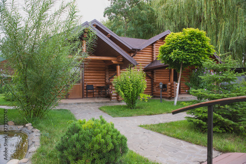 Country cottages with log and timber in the green area. cozy eco-friendly houses made of natural wood, bungalows for families