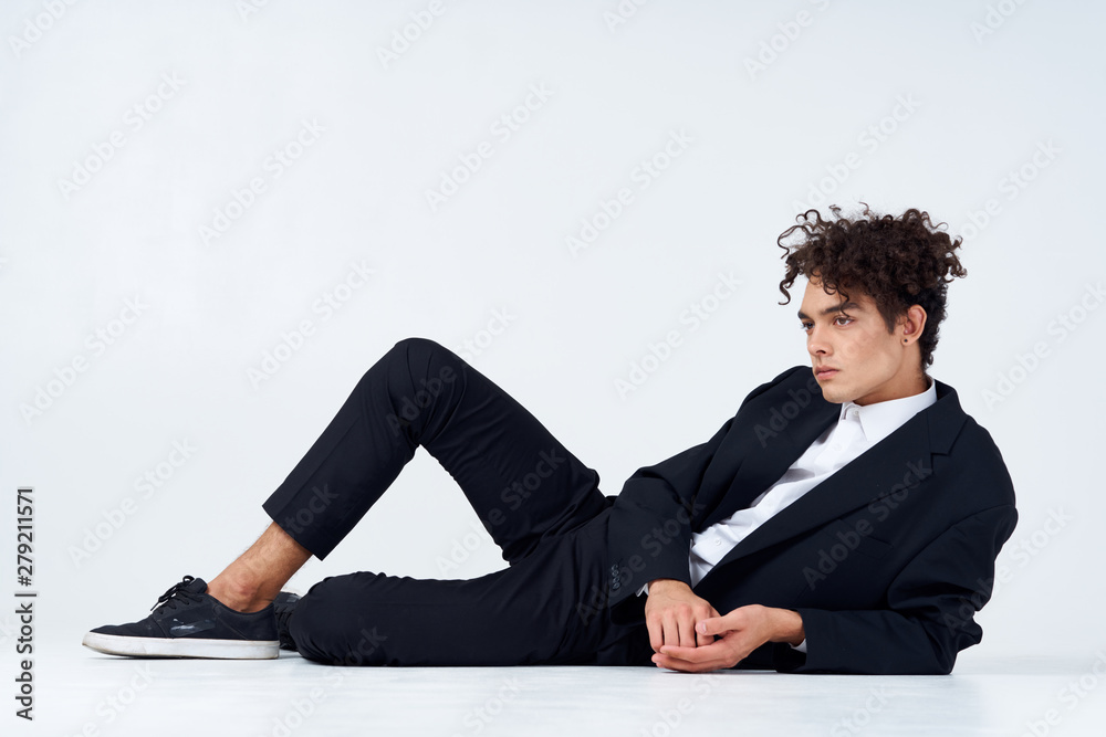 businessman sitting on the floor with laptop businessman sitting on the floor with laptop