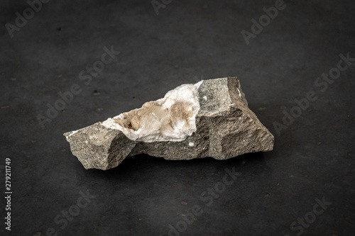 Piece of rock containing natural asbestos parts found in nature