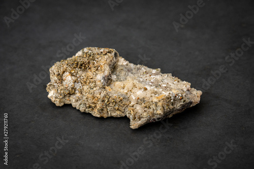 Pyrite yellow gemstone looking like gold sparkling in light