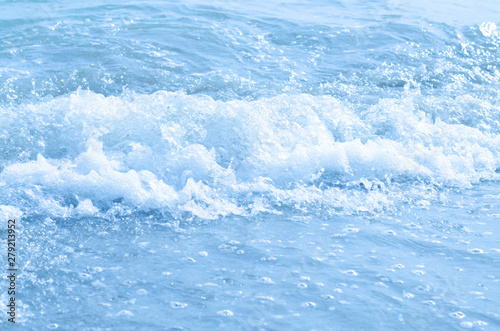 Closeup sea wave in blue color.