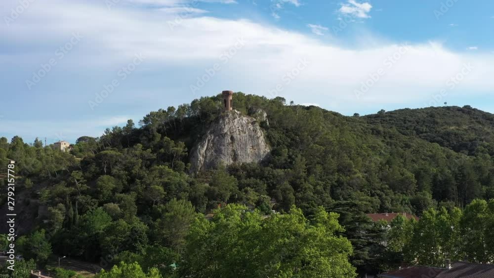 Guisquet tower Saint Amrboix on a rock with forest aerial shot Guisquet tower Saint Amrboix on a rock with forest aerial shot
