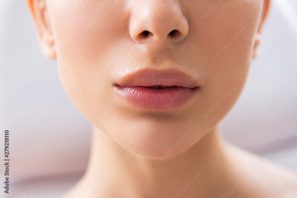 Young lady with soft skin and plush lips Young lady with soft skin and plush lips
