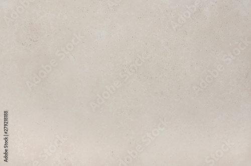 The surface texture of natural stone travertine.