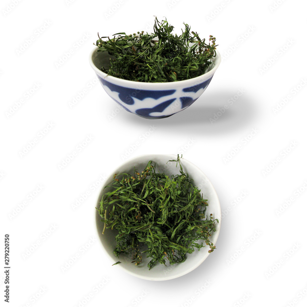 bowl of green tarragon, spices for food, on a white background