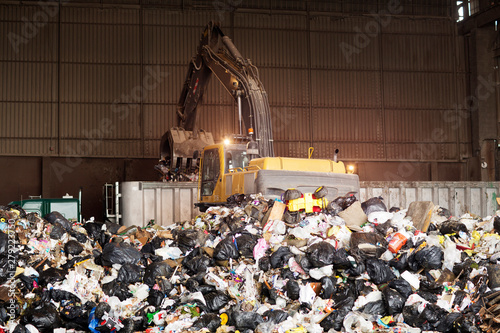 Photography Forklift gathering garbage at recycling plant