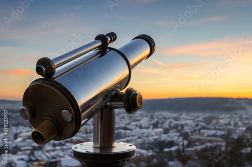 Quadro su tela Monocular telescope in winter at sunset over Marburg, Germany