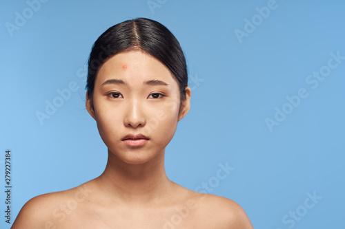 portrait of a young beautiful woman with perfect skin