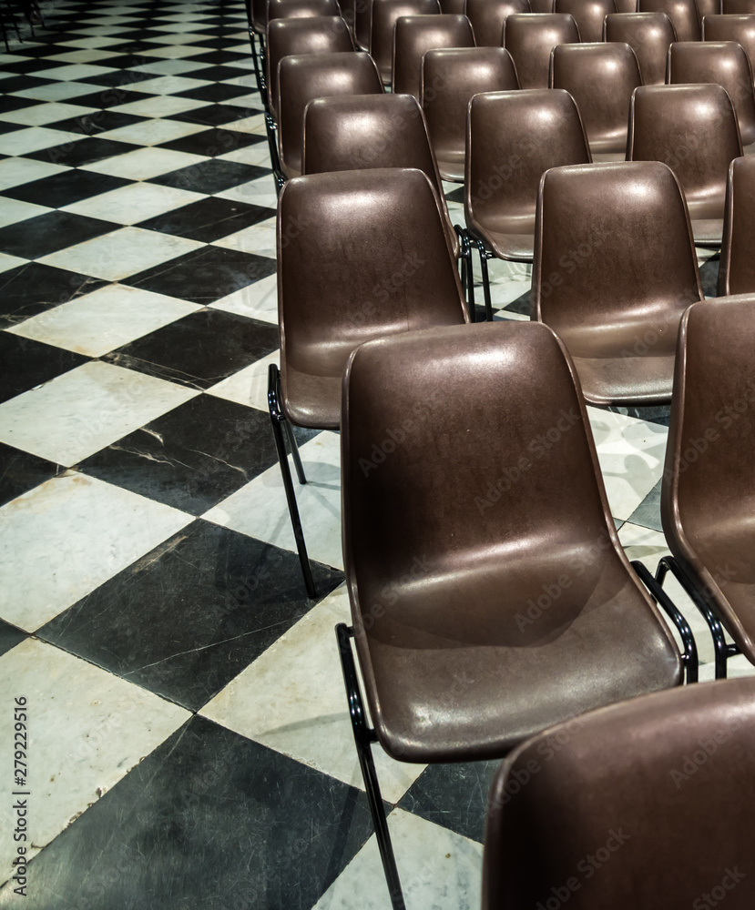Obraz premium Chairs in a row in Caravaggio shrine, Italy