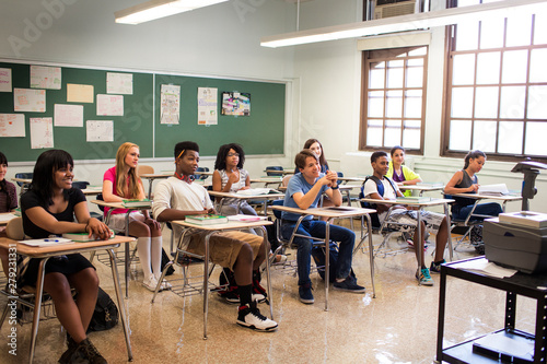 Foto Students sitting in classroom