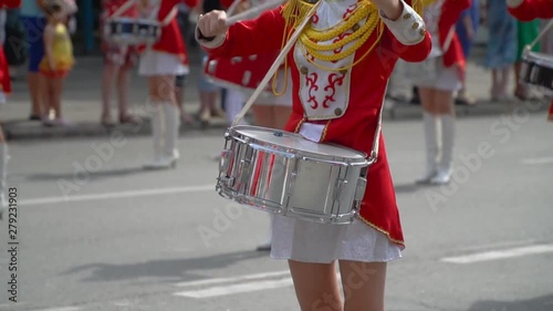 Close-up of female hands drummers are knocking in the drum of their sticks. Slow motion