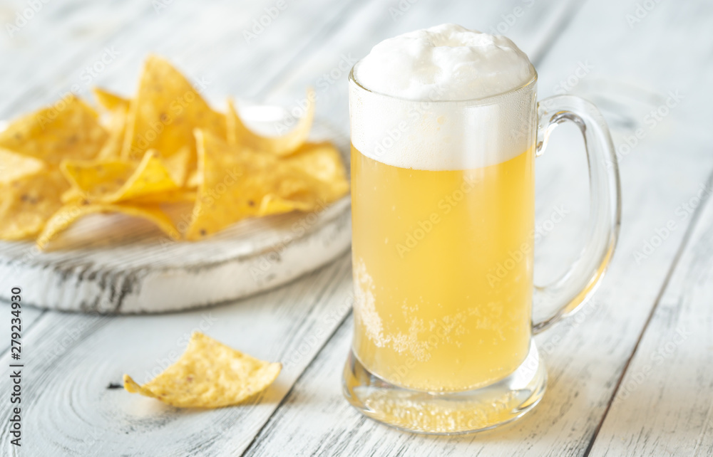 Mug of beer with tortilla chips Mug of beer with tortilla chips