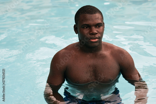 man in swimming pool © SHOTPRIME STUDIO