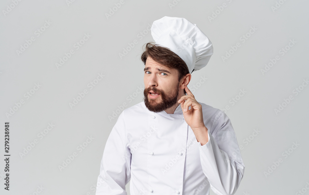 young cook in white uniform young cook in white uniform