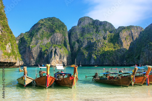 Longtail boats anchored at Maya Bay on Phi Phi Leh Island, Krabi Province, Thailand © donyanedomam