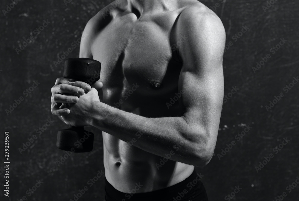 Naklejka premium muscular man lifting weights
