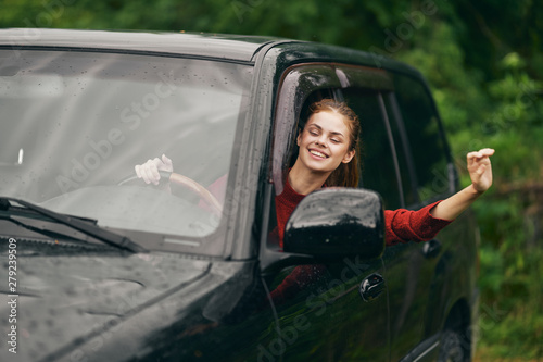 young woman in car