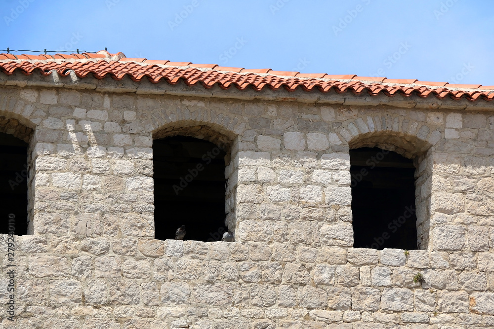 Architectural detail of historical Skrivanat Tower in town Pag, on island Pag, Croatia. Architectural detail of historical Skrivanat Tower in town Pag, on island Pag, Croatia.