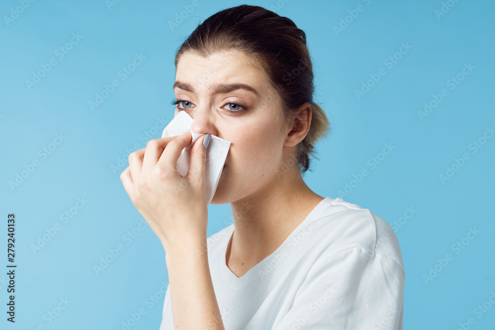 portrait of a woman blowing her nose portrait of a woman blowing her nose